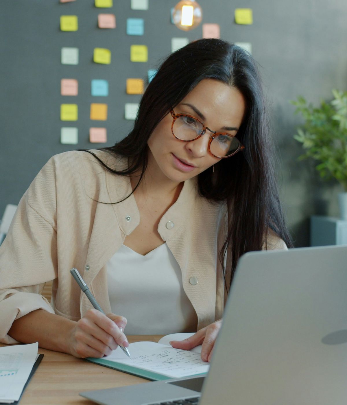 Katie working at her desk