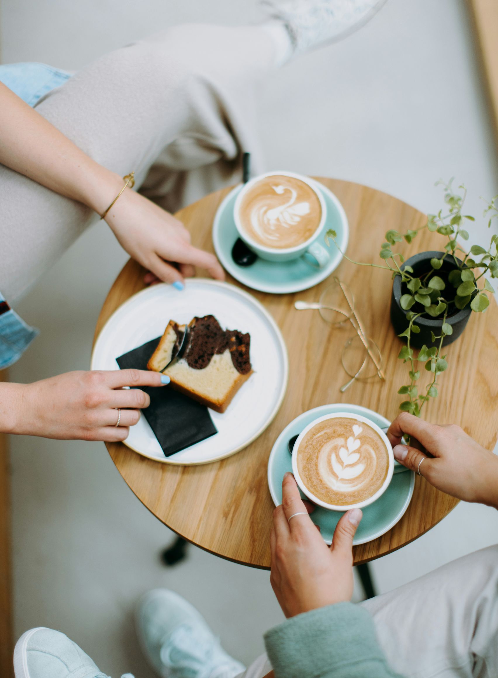 Coffee and cake shared around a table